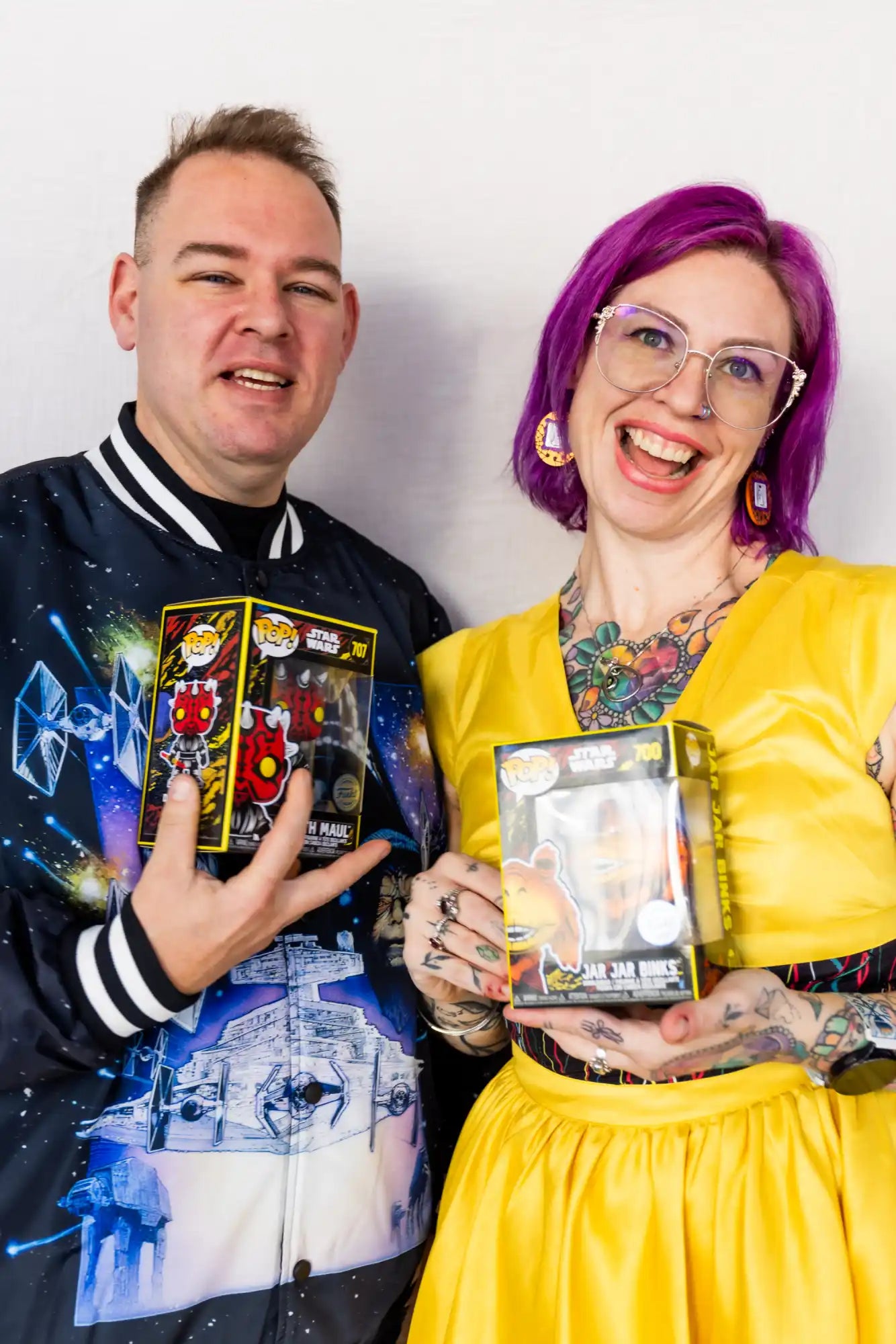 Yellow and black action figure box with colorful design, likely from a popular toy brand.